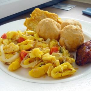 Sunday- Ackee, Callaloo, Hardough Bread, Fried Plantains, Soft-boiled Egg, Beef Liver and boiled Green Bananas, Hot Chocolate (from home-made Jamaican chocolate) or Coffee, Butter, Roast & Fried Breadfruit, Fried Dumplings, Fried Bammy, Bacon or Ham, and Water.